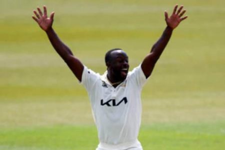 Fast bowler Kemar Roach celebrates a wicket during the third day of the County Championship match against Hampshire yesterday. 