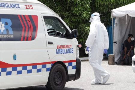 A medical worker at the Siparia Health Facility in full PPE gear at work on Sunday.