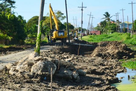 Major work is continuing on the road leading to the University of Guyana. This Orlando Charles photo was taken yesterday.