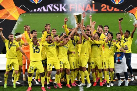 The Villareal players celebrate their title triumph. 