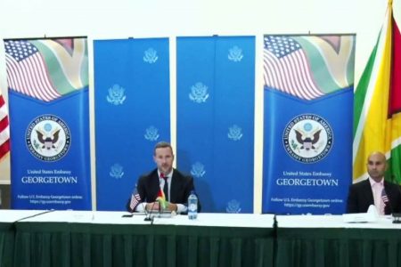 Head of America’s Development Bank, Adam Boehler (centre), US Ambassador Sarah-Ann Lynch (left) and then Private Sector Commission Chairman Nicholas Deygoo-Boyer at the press conference held in October at the Pegasus Hotel. (SN file photo)