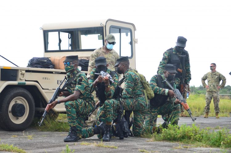 GDF ranks positioning themselves during a drill exercise at Camp London yesterday as training continued under the US Southern Command-sponsored Tradewinds 21 military exercise. (Orlando Charles photo)
