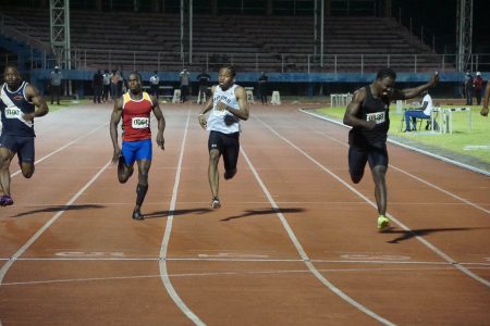 Flashback-Emanuel Archibald (right) racing away to victory and achieving his personal best at the recently
concluded Guyana National Track and Field Championships at the National Track and Field Centre, Leonora