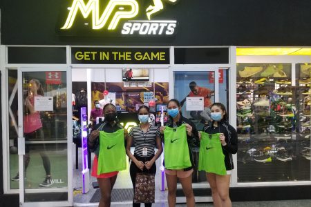 Members of the Guyana Women’s Hockey Team displaying their training vests donated by MVP Sports to be worn at the Indoor Pan Am Cup (IPAC) in the USA