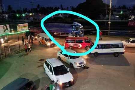 The bus and parked lorry that were involved in the accident. 