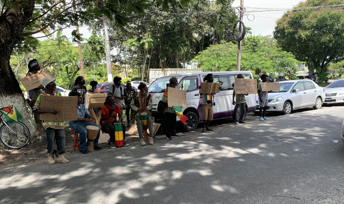 Members of the Rastafarian community as they protested outside the Office of the Attorney General 