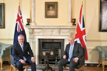 Britain's PM Johnson (right)  and Australia's PM Morrison met ahead of trade deal announcement, in London. (Reuters photo)