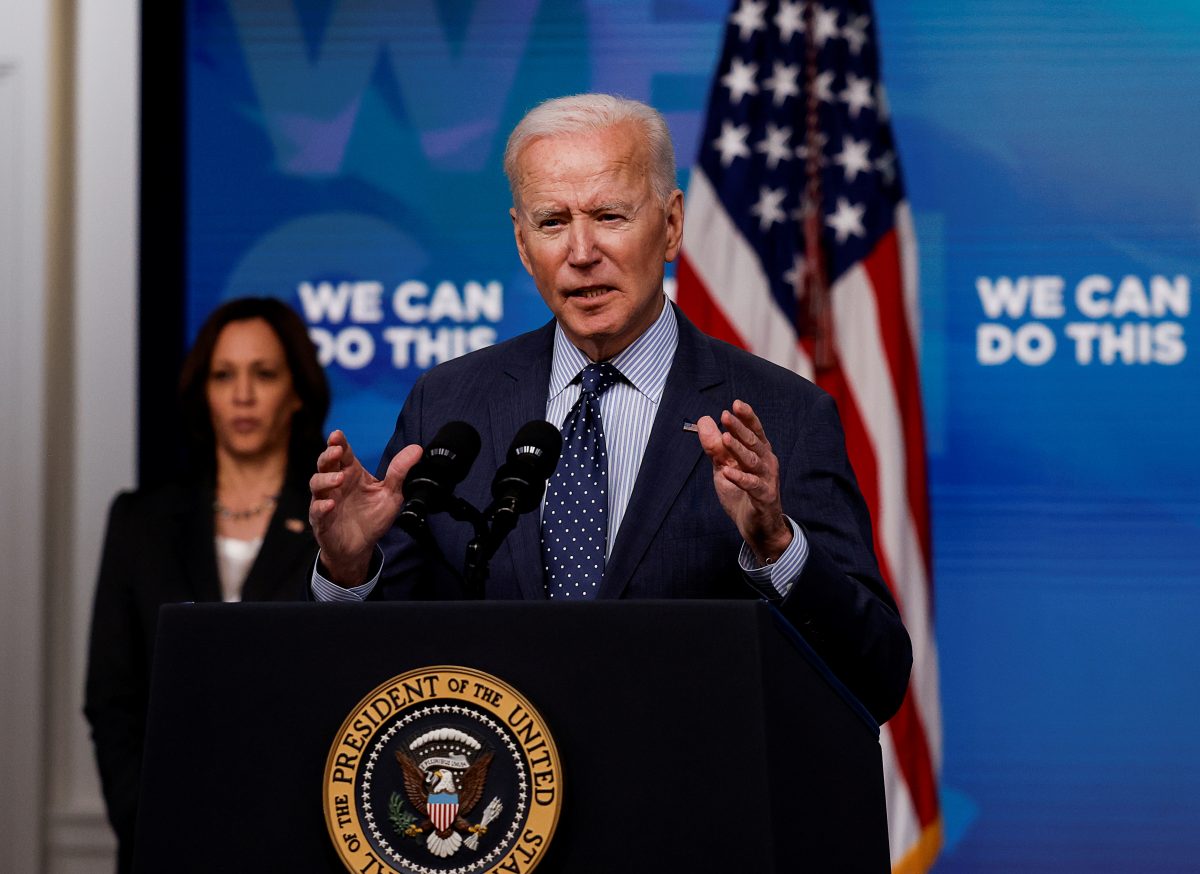 FILE PHOTO: U.S. President Joe Biden delivers remarks on his administration’s coronavirus disease (COVID-19) response, as Vice President Kamala Harris stands by in the Eisenhower Executive Office Building’s South Court Auditorium at the White House in Washington, U.S., June 2, 2021. REUTERS/Carlos Barria/File Photo