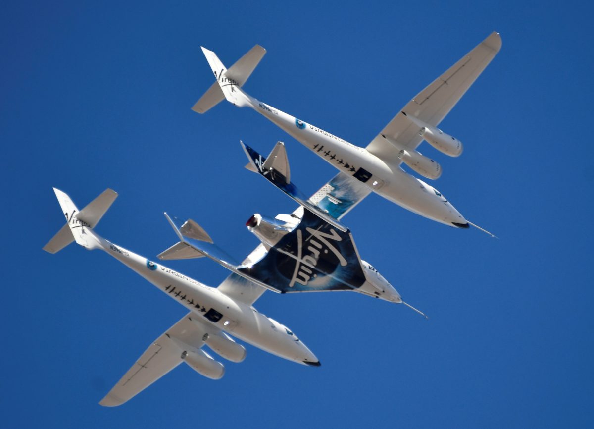 FILE PHOTO: Virgin Galactic rocket plane, the WhiteKnightTwo carrier airplane, with SpaceShipTwo passenger craft takes off from Mojave Air and Space Port in Mojave, California, U.S., February 22, 2019.  REUTERS/Gene Blevins/File Photo