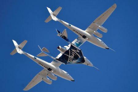 FILE PHOTO: Virgin Galactic rocket plane, the WhiteKnightTwo carrier airplane, with SpaceShipTwo passenger craft takes off from Mojave Air and Space Port in Mojave, California, U.S., February 22, 2019.  REUTERS/Gene Blevins/File Photo
