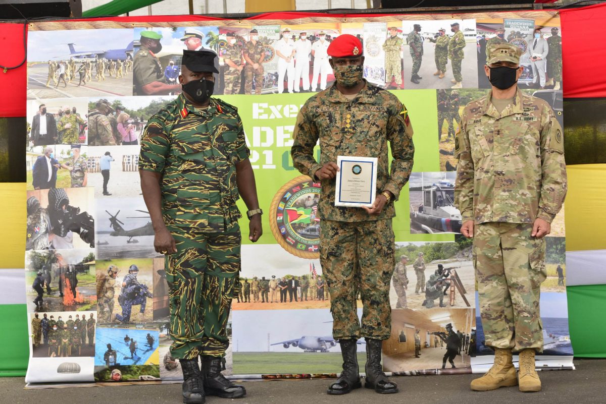 The Head of the Jamaican contingent (centre) receiving a plaque of participation from GDF’s Chief of Staff Godfrey Bess (left) and Major General Rafael Ribas (GDF photo)