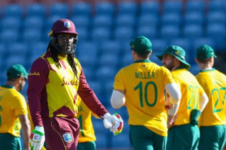 Chris Gayle leaves the field after falling cheaply in the second T20 International yesterday. 