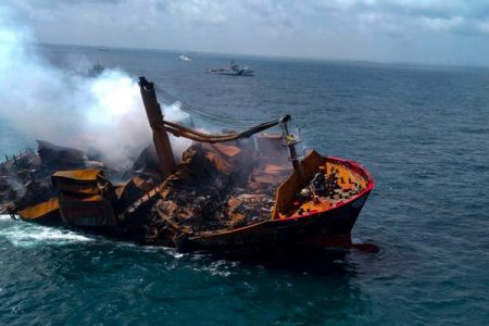 Smoke rises from a fire onboard the MV X-Press Pearl vessel as it sinks while being towed into deep sea off the Colombo Harbour, in Sri Lanka Jun 2, 2021. REUTERS