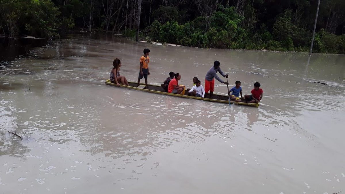 Residents of Three Friends navigate the community in a canoe. (Photo credit: Travis Farose).
Coomacka1The breach in the tailings pond at East Montgomery Mines, which has resulted in flooding of the communities in the vicinity of Coomacka, in Region Ten
Coomacka2A house within the community of Three Friends, Region 10, which was flooded following the breach of the East Montgomery tailings pond.
Coomacka3