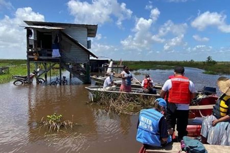 The residents of this Region Five house have been surrounded by floodwater. They were visited over the weekend by the Detailed Damage Sector Analysis (DDSA) team. (Civil Defence Commission photo)