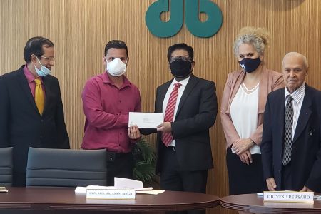 From left are Chief Executive Officer of Demerara Bank Pravinchandra Dave, a beneficiary of the TFFP programme, Senior Minister with responsibility for Finance Dr. Ashni Singh, IDB Country Representative Sophie Makonnen and Founder and Chairman of Demerara Bank Dr Yesu Persaud. 