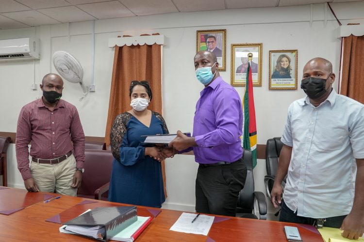 From left are Ayeni John, architect attached to VIKAB Engineering Consultants Limited; Keshiri Gajraj, Manager of S&K Construction and Consultancy Services and General Supplies; Permanent Secretary, Alfred King and GSDEP Coordinator, Theron Siebs following the signing of the contract agreement. (Ministry of Education photo)
