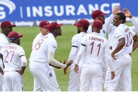  West Indies celebrate a wicket with fast bowler Shannon Gabriel (far right). 