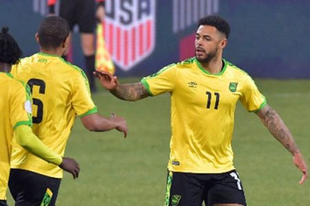 (Captiob) Andre Gray (right) scored his debut goal for Jamaica. 