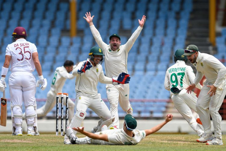 THE MOMENT: Wiaan Mulder (on the ground) celebrates the catch at leg-slip off
Joshua Da Silva as his South African teammates celebrate Keshav Maharaj’s hat-trick. 