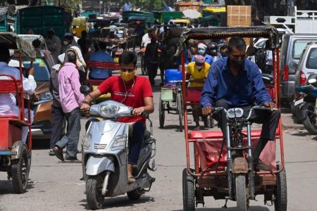 Traffic has returned to the roads of New Delhi, after the Indian authorities reopened parts of the economy on Monday.PHOTO: AFP