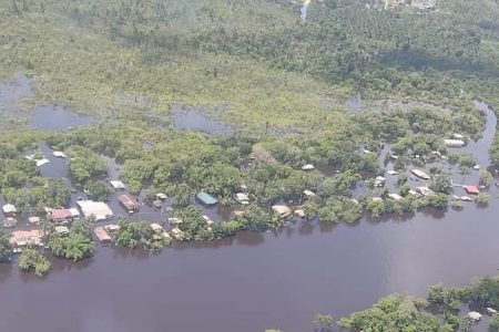 An overhead shot of flooding at Kwakwani in Region Ten (Civil Defence Commission photo)