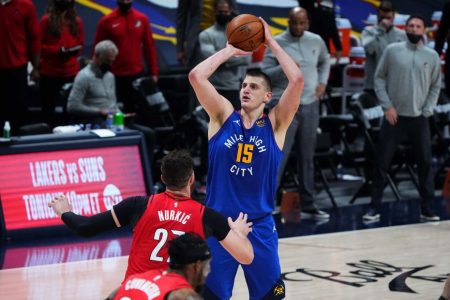 Nikola Jokic was the top scorer with 38 points as the Denver Nuggets outlasted the Portland Trailblazers in double overtime Tuesday night. Mandatory Credit: Ron Chenoy-USA TODAY Sports