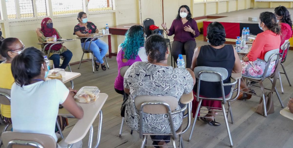 Minister Vindhya Persaud speaking to women at the outreach. (Ministry of Human Services and Social Security photo)