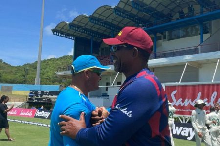 West Indies head coach Phil Simmons, right, is upset with his team’s batting displays.