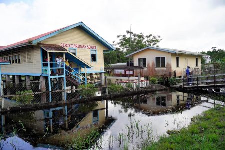 The flooded compound of the Siriki Primary School, Upper Pomeroon (Office of the President photo)