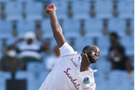 Fast bowler Kemar Roach sends down a delivery during his four-wicket haul on yesterday’s third day of the second Test. 