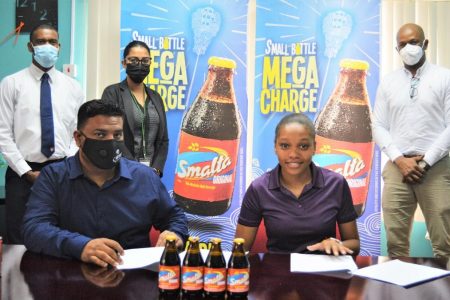 Members of the Smalta and CBL team during the contract signing with Chelsea Edghill. 