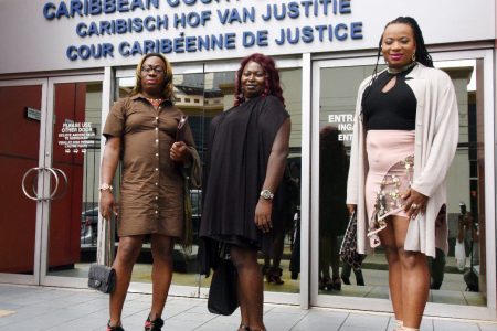 From left are Angel Clarke, Gulliver and Peaches Fraser outside of the CCJ’s headquarters 