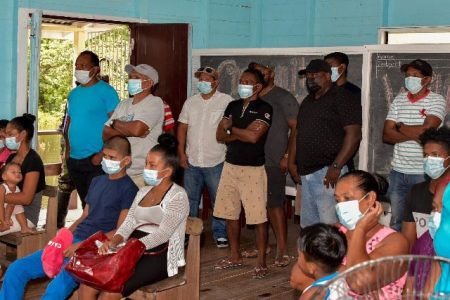 Residents gathered yesterday to listen to the PM (DPI photo)
