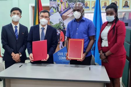 In photo from left to right are Li Yang, Embassy Representative;  Chen Xilai, Charge d’ Affaires; Lieutenant Colonel Kester Craig, Director General of the CDC; and Sophia Darlington-Browne, Foreign Service Officer at the Ministry of Foreign Affairs and International Corporation.