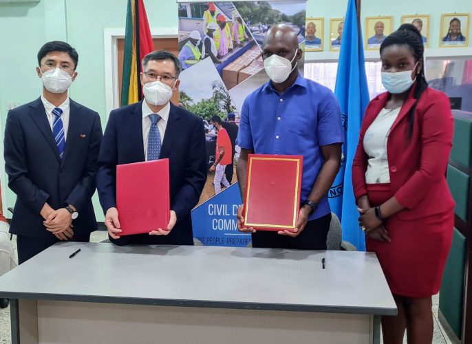 In photo from left to right are Li Yang, Embassy Representative;  Chen Xilai, Charge d’ Affaires; Lieutenant Colonel Kester Craig, Director General of the CDC; and Sophia Darlington-Browne, Foreign Service Officer at the Ministry of Foreign Affairs and International Corporation.