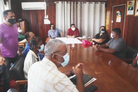  Attorney General Anil Nandlall and Minister of Agriculture, Zulfikar Mustapha (seated at head of table) meeting with farmers 