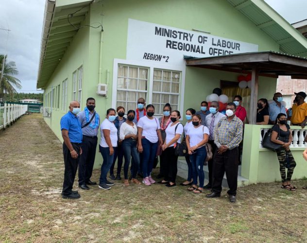 The Minister of Labour posing with the Board of Industrial Training trainees in front of the newly commissioned Ministry of Labour Office at Anna Regina, Pomeroon-Supenaam (Region Two)