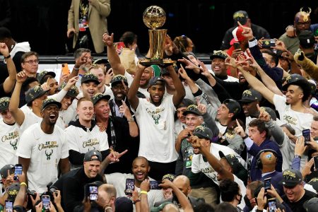The Milwaukee Bucks players celebrate their first NBA championship in 50 years.