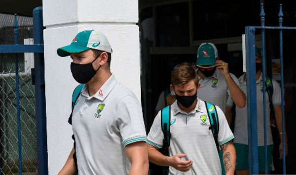 Members of the Australia side leave Kensington Oval following the suspension of Thursday’s second ODI against West Indies. 