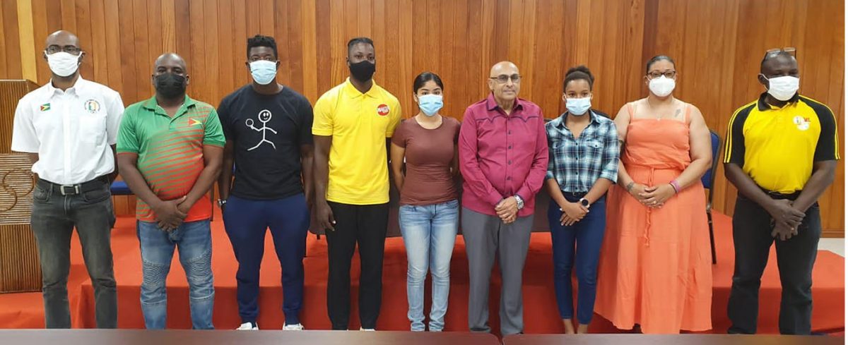 Some members of the travelling delegation pose for a photo with President of the Guyana Olympic Association (GOA), K Juman-Yassin who stands fourth from right. 