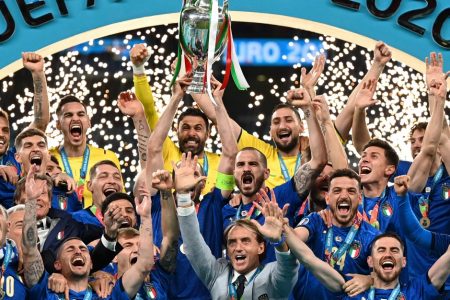 The Italian players celebrate their Euro Cup triumph.
