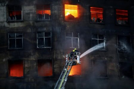 Firefighters at the scene of a fire that broke out at a factory in Narayanganj on July 9, 2021.PHOTO: REUTERS