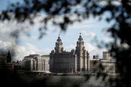Liverpool's iconic waterfront property the Royal Liver building is viewed across the River Mersey in Birkenhead , northern England October 17 , 2016. The 105 year old building is to be sold for the first time, for an expected 40 million pounds ($50 million). REUTERS/Phil Noble