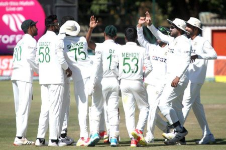 Mehidy Hasan Miraz and the rest of the Bangladesh players celebrate their test triumph. (Photo courtesy Zimbabwe Cricket/Twitter)