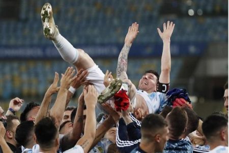 Lionel Messi celebrates with his teammates after they defeated Brazil 1-0 in yesterday’s Copa America final.