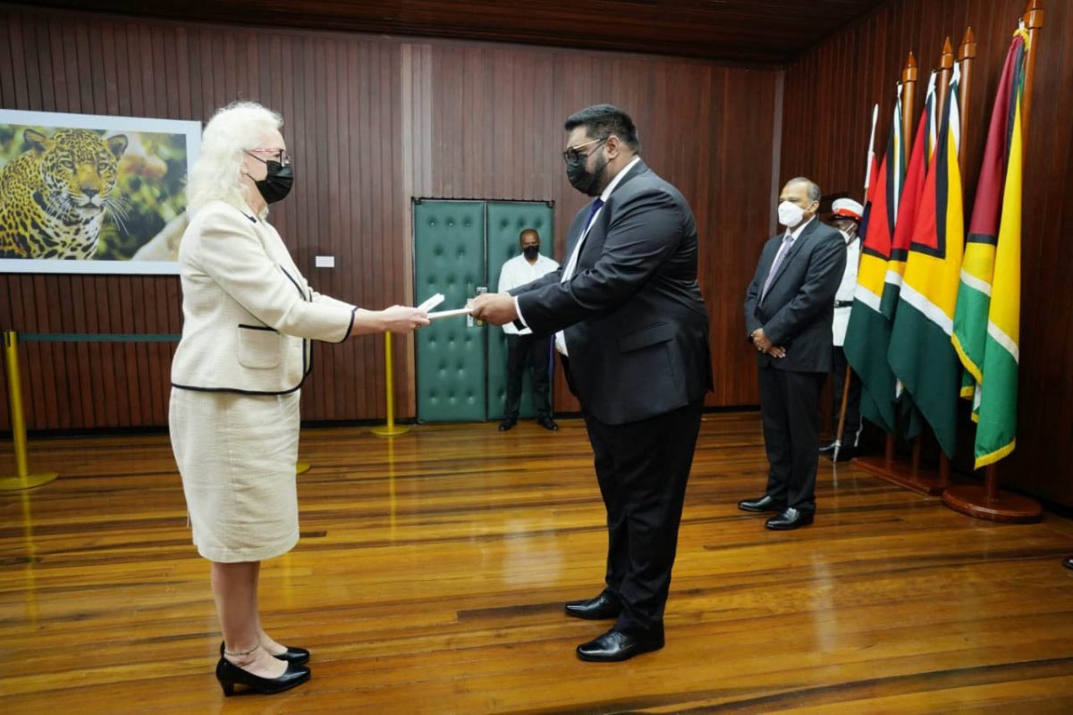 Jane Miller (left) presenting her letters of credence yesterday to President Irfaan Ali (Office of the President photo)