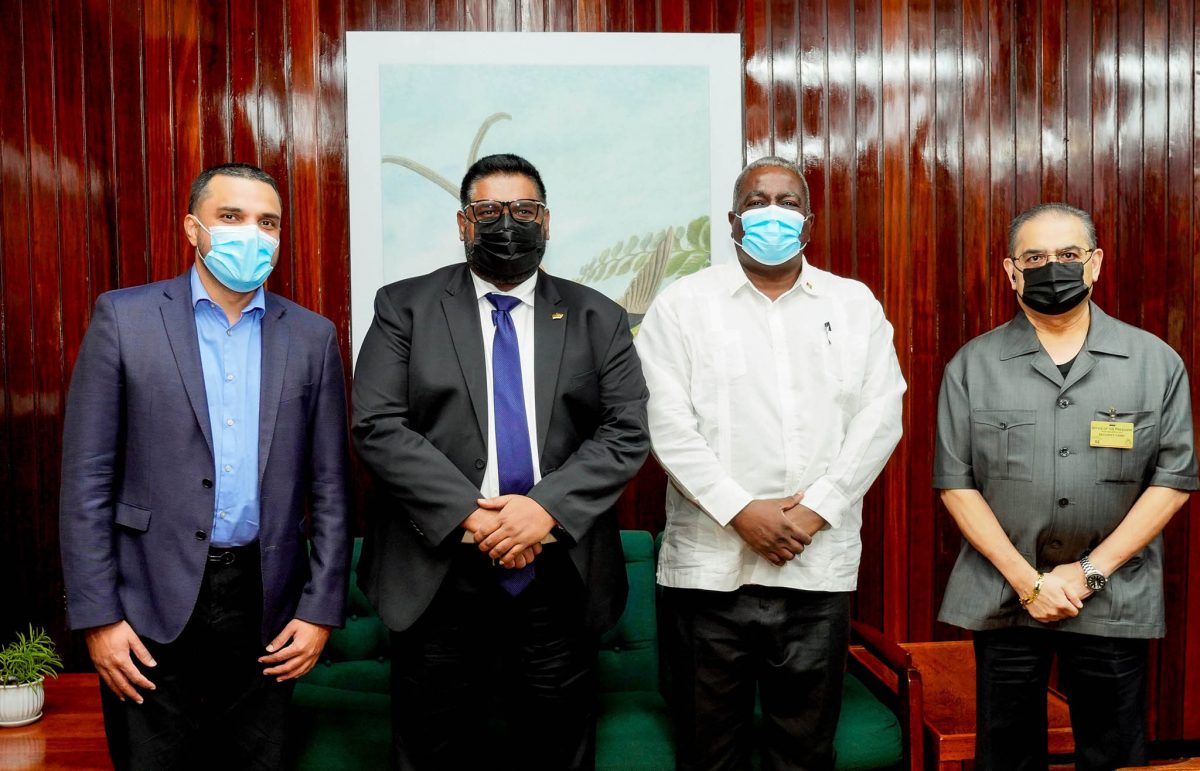President Irfaan Ali (second from left) with Prime Minister Mark Phillips (second from right), Vishok Persaud (left) and Rakesh Puri. (Office of the President photo)