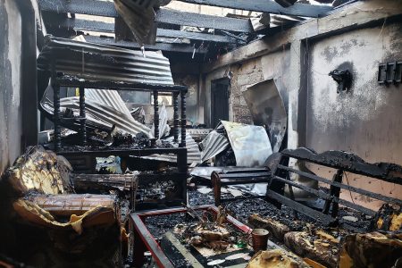 After the blaze: The charred interior of one of the Rasville apartments that was devastated by a fire on Saturday afternoon