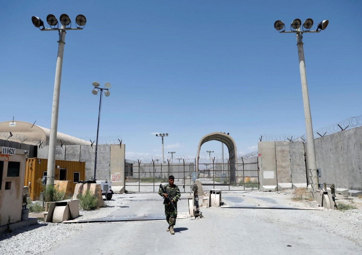 An Afghan National Army soldier stands guard at the gate of Bagram air base, on the day the last of American troops vacated it, in Parwan province, Afghanistan, on Friday. REUTERS/Mohammad Ismail